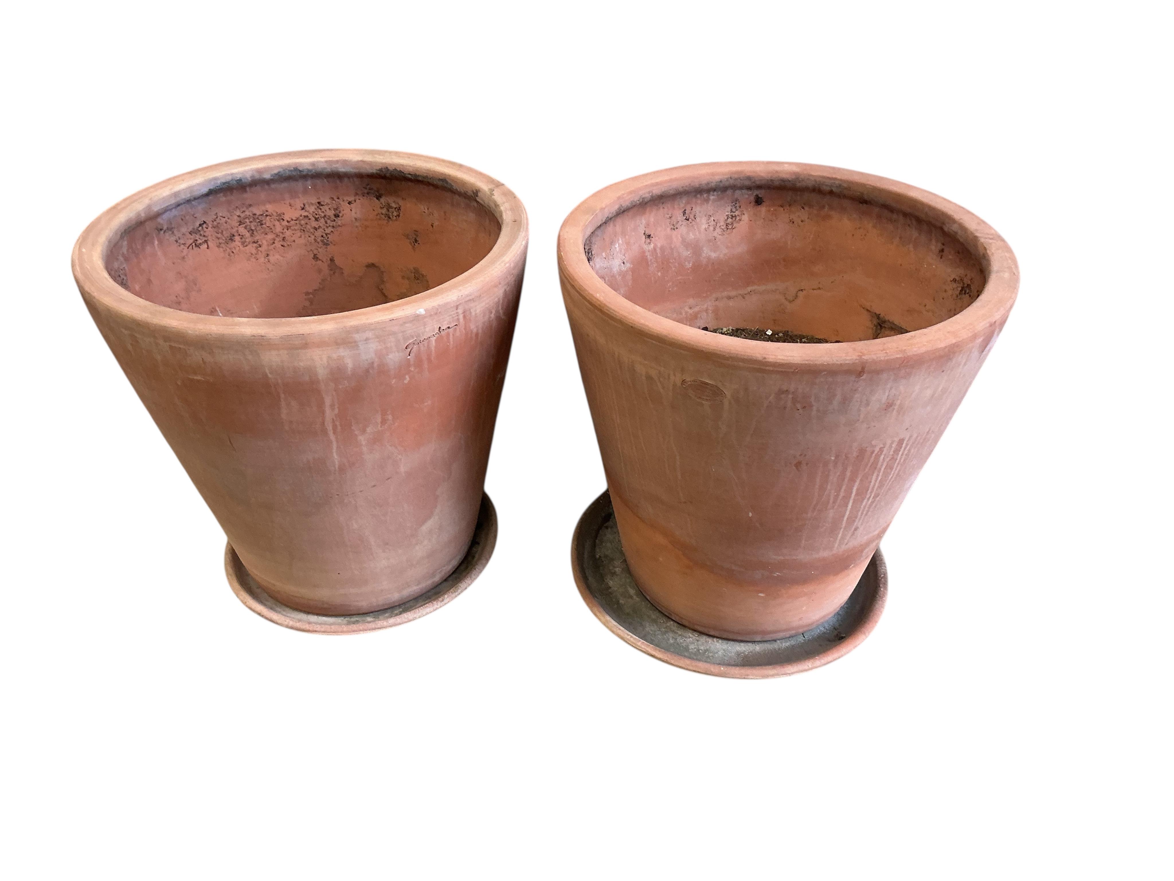 A pair of Goicoechea circular pottery planters with tray bases, diameter 54cm, height 53cm